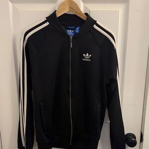 Men’s Adidas Original Black Jacket with White stripes on sleeves
